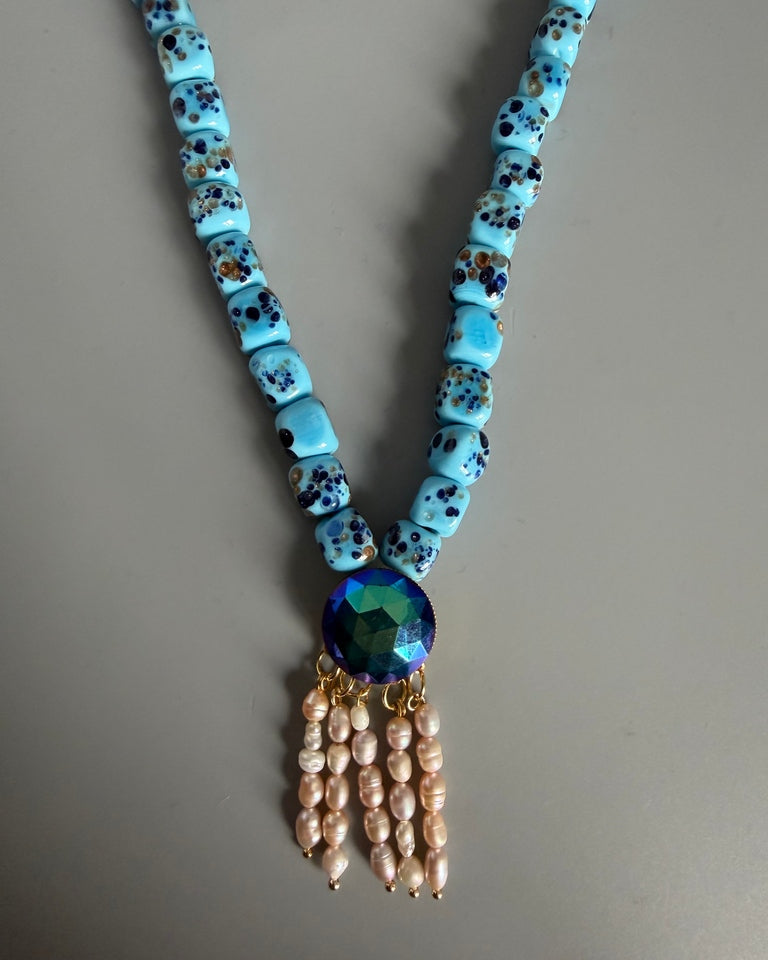 Collar Plumas doradas