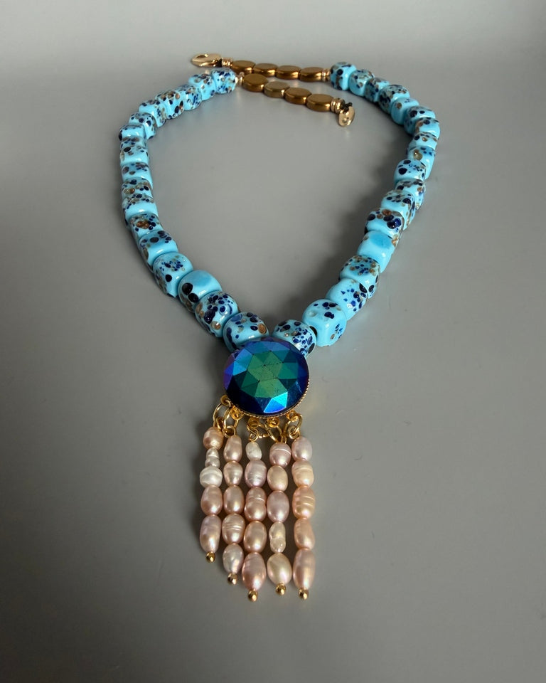 Collar Plumas doradas